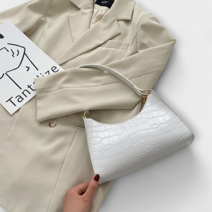 Cécile. - Lesklá kožená taška